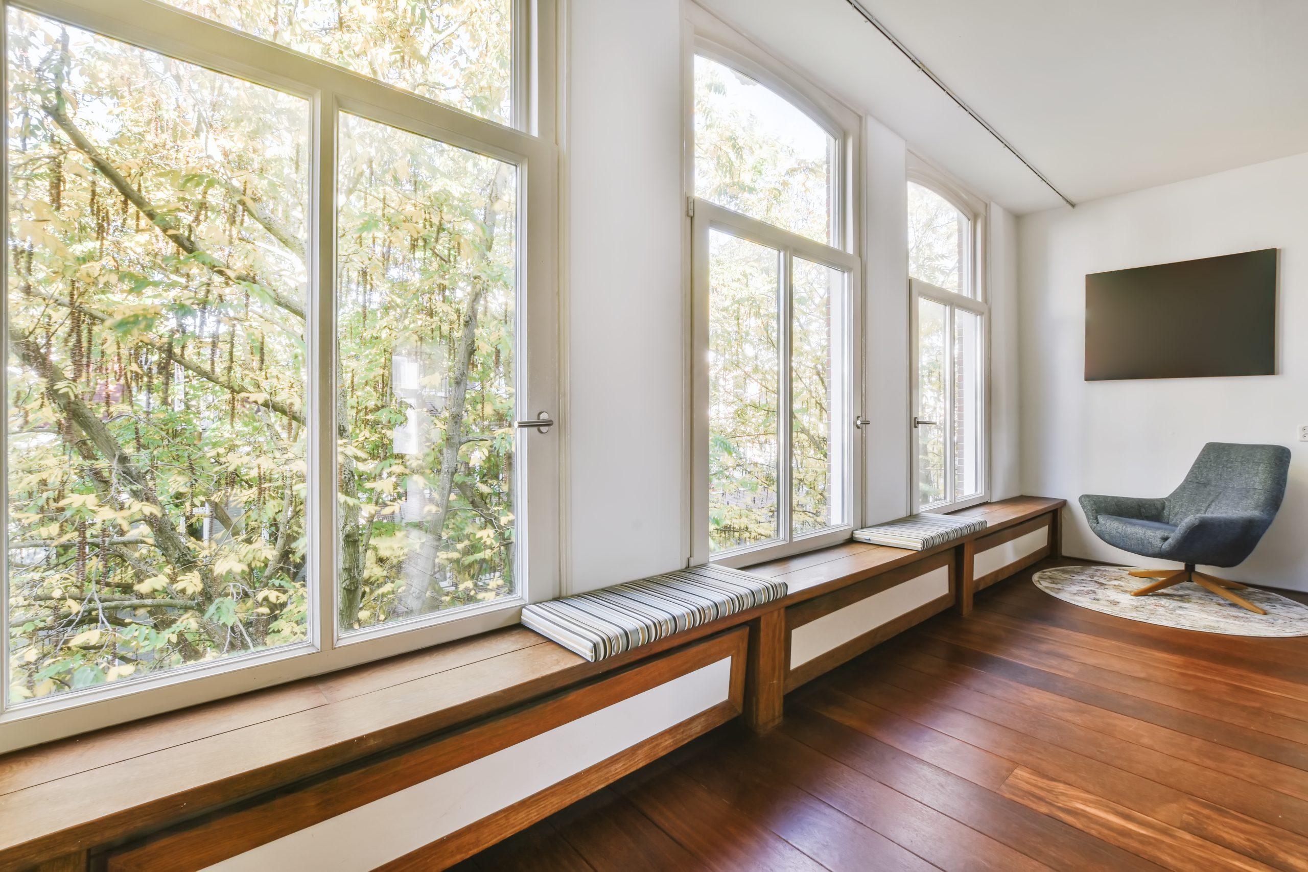 Sparkling clean windows of an elegant living room.