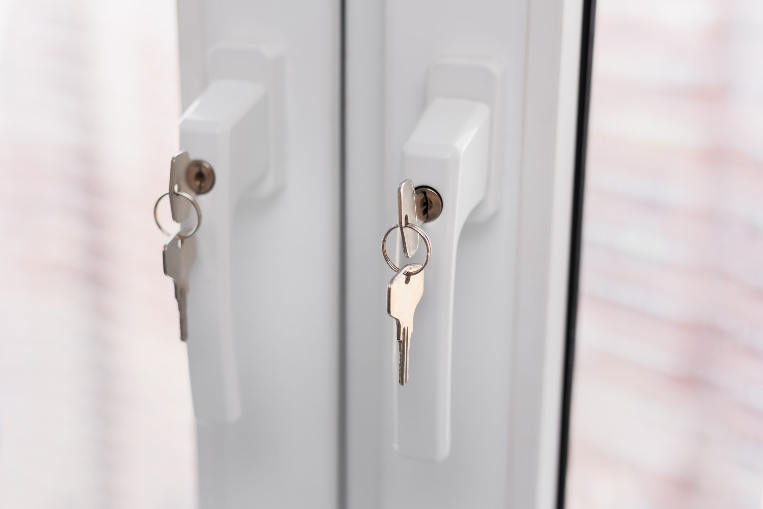 A secure home with locked windows, protected by a home watch service.